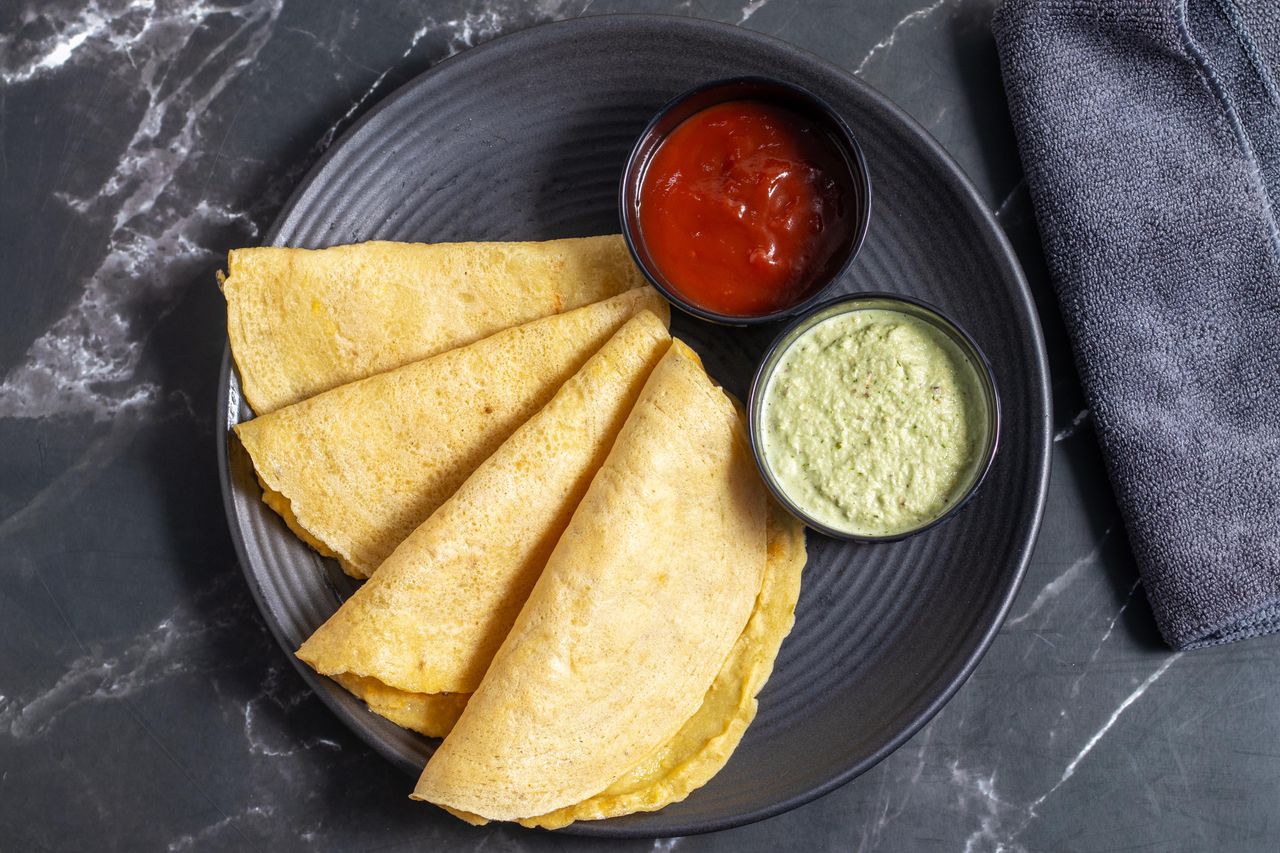 Moong dal chilla is an Indian pancake made from ground mung beans.