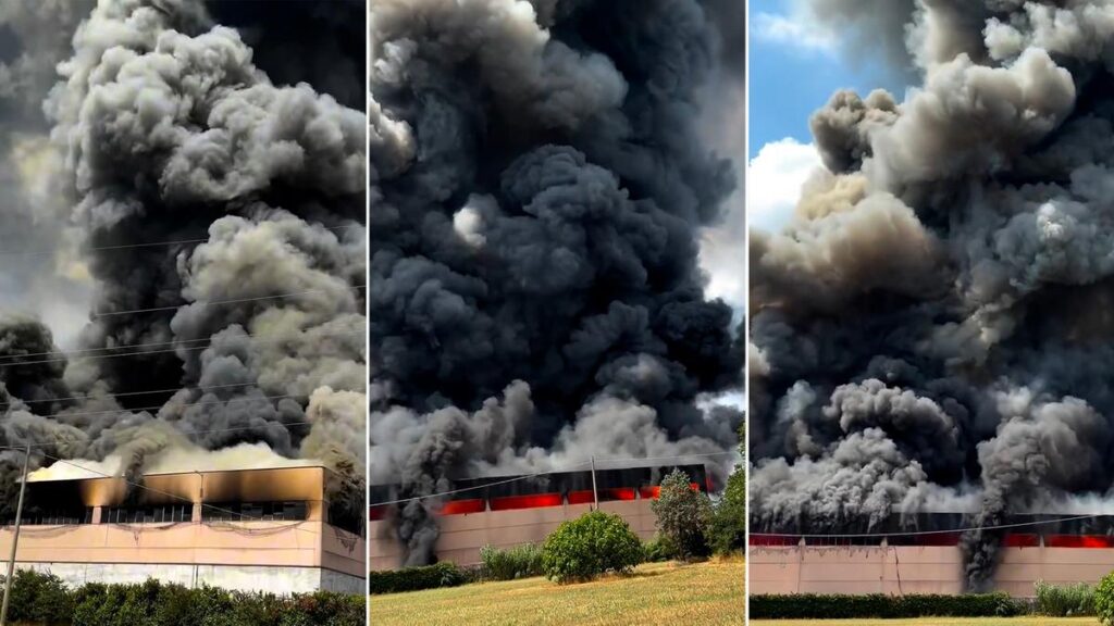 Incendie d'un dépôt de caoutchouc et plastique : un lac sous un nuage noir